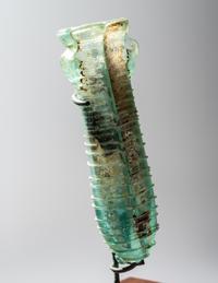 A Roman Pale Blue Glass Double Unguentarium