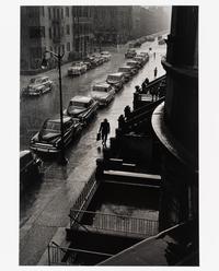 Ruth Orkin (1921-1985) Man in Rain, West 88th Street, New York City, 1952