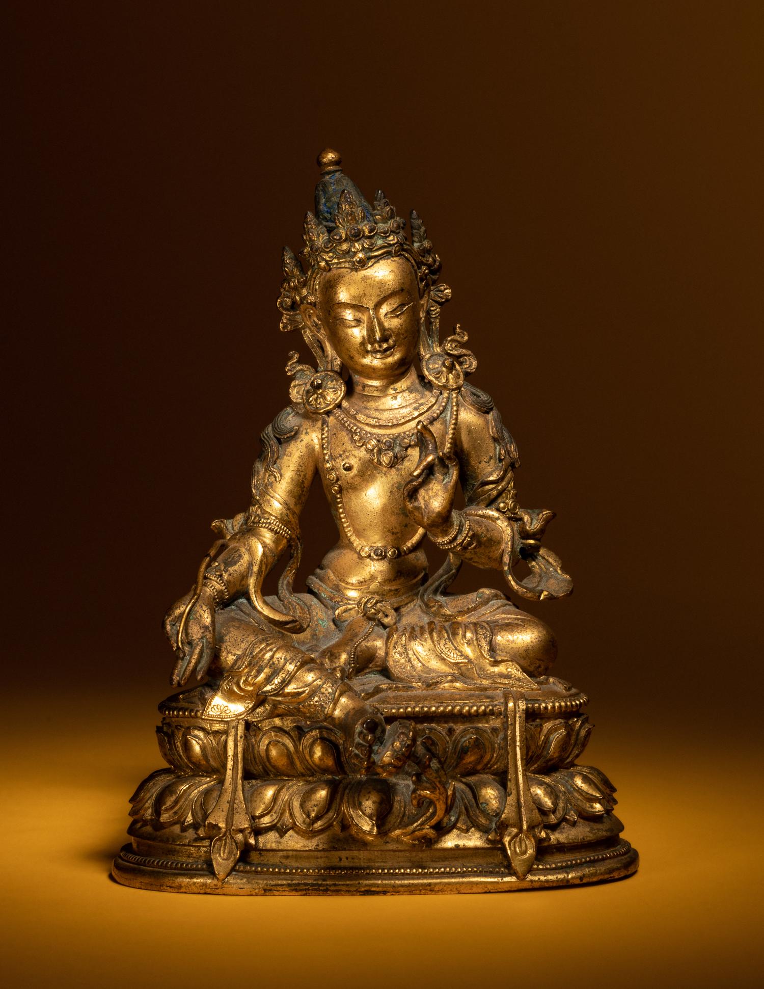 A Sino-Tibetan Gilt Bronze Figure of Seated Tara