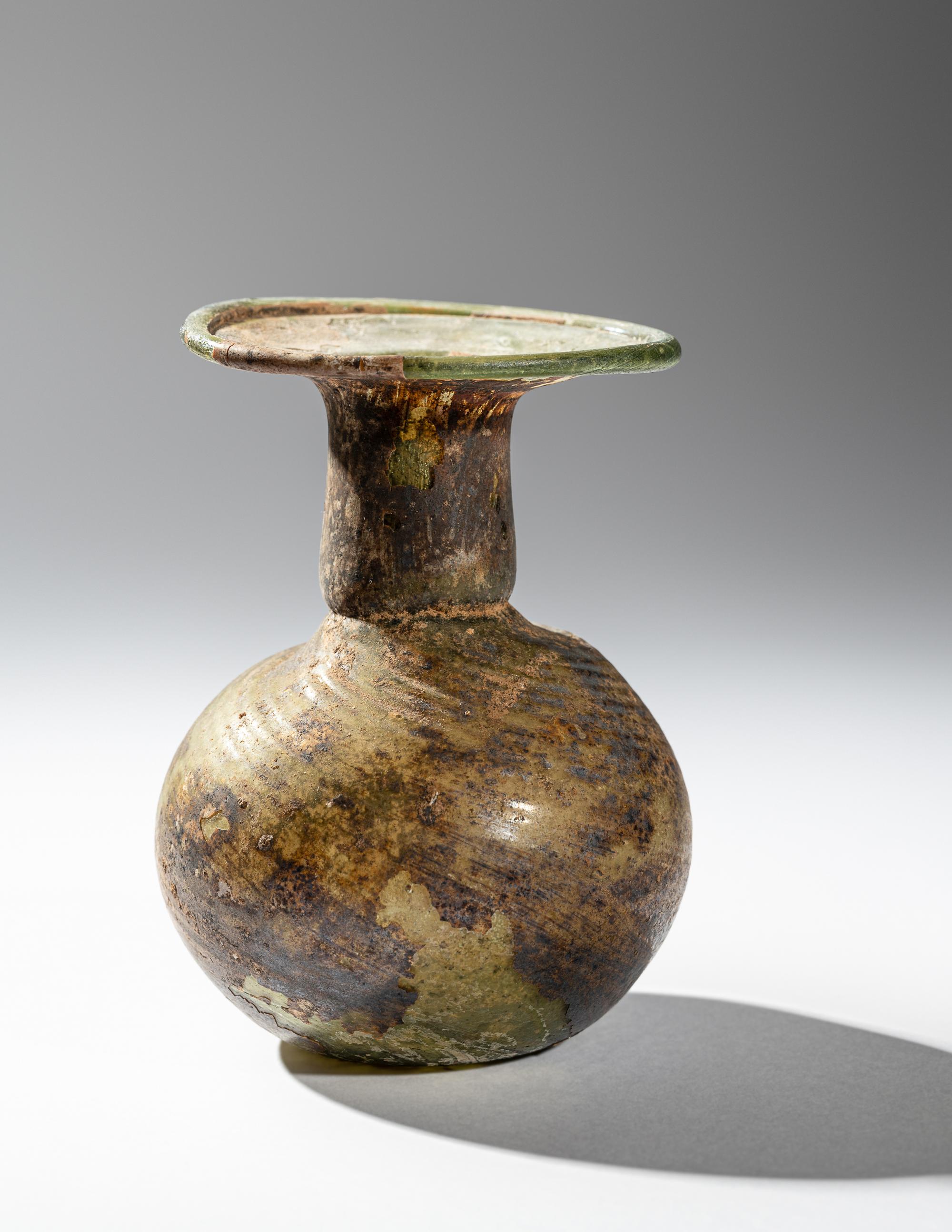 A Roman Green Glass Bottle