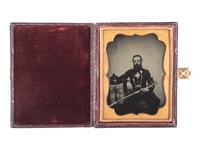[EARLY PHOTOGRAPHY - MILITARY]. Quarter plate ambrotype portrait of a English Rifle Volunteer officer holding his sword. [Ca late 1850s].