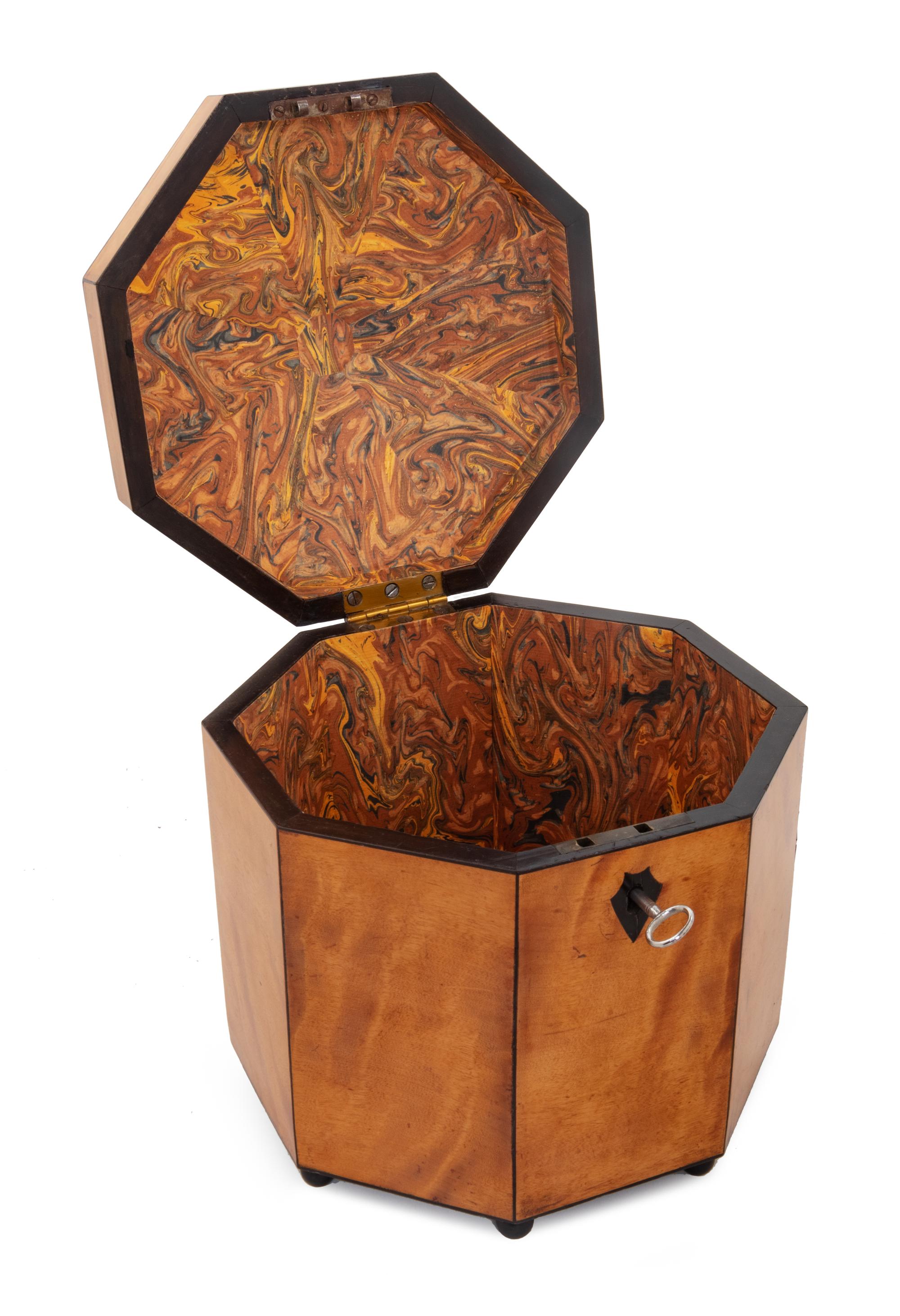 A Biedermeier Ebony Banded Satinwood Octagonal Tea Caddy