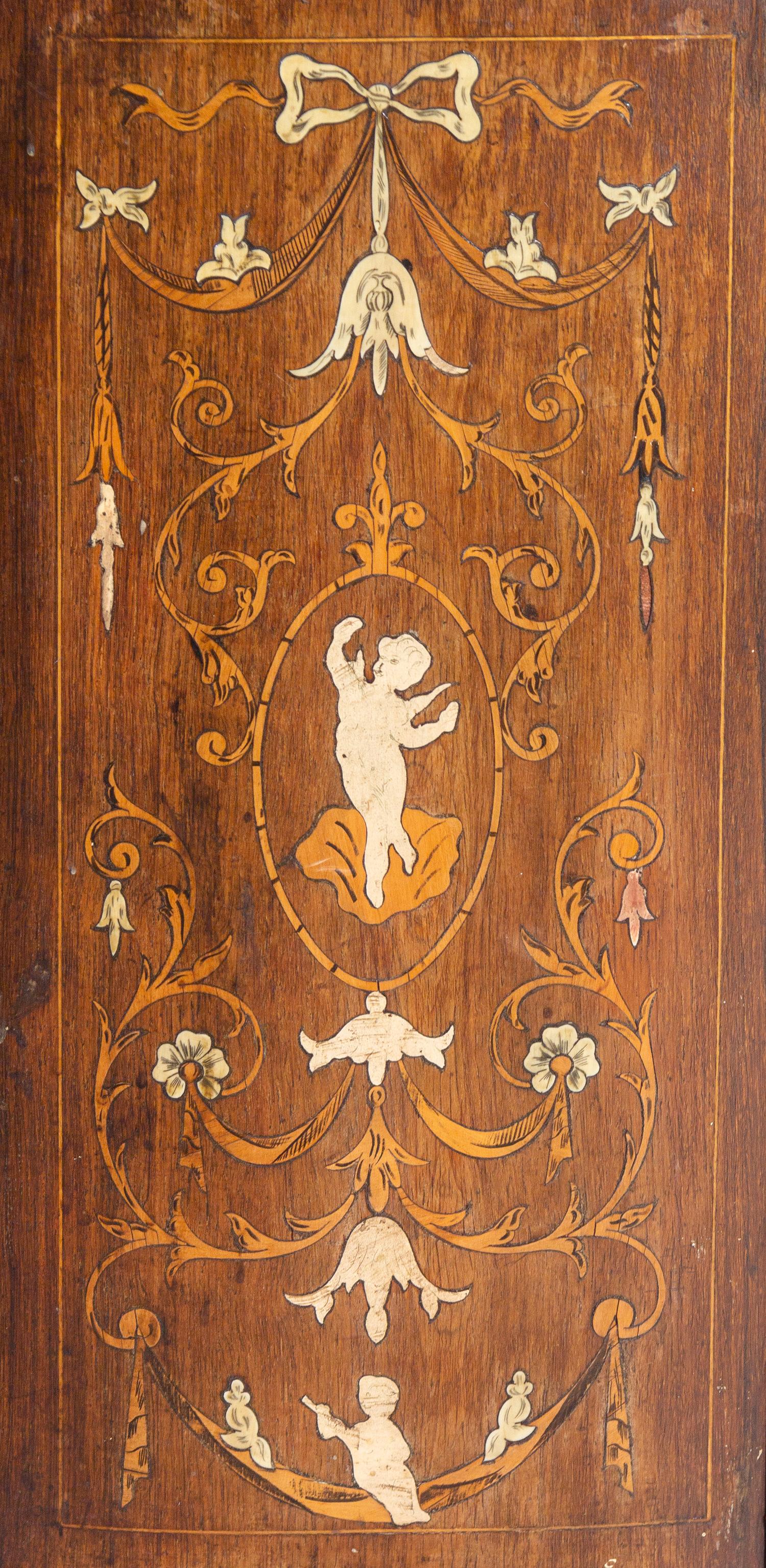An Italian Neoclassical Style Marquetry Decorated Walnut Cabinet