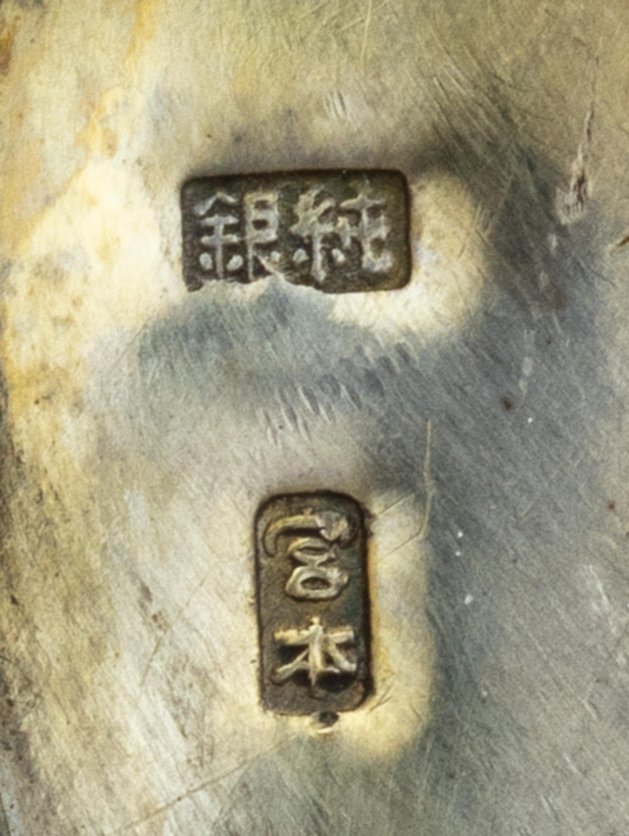 A Japanese Miniature Helmet-Form Salt Shaker