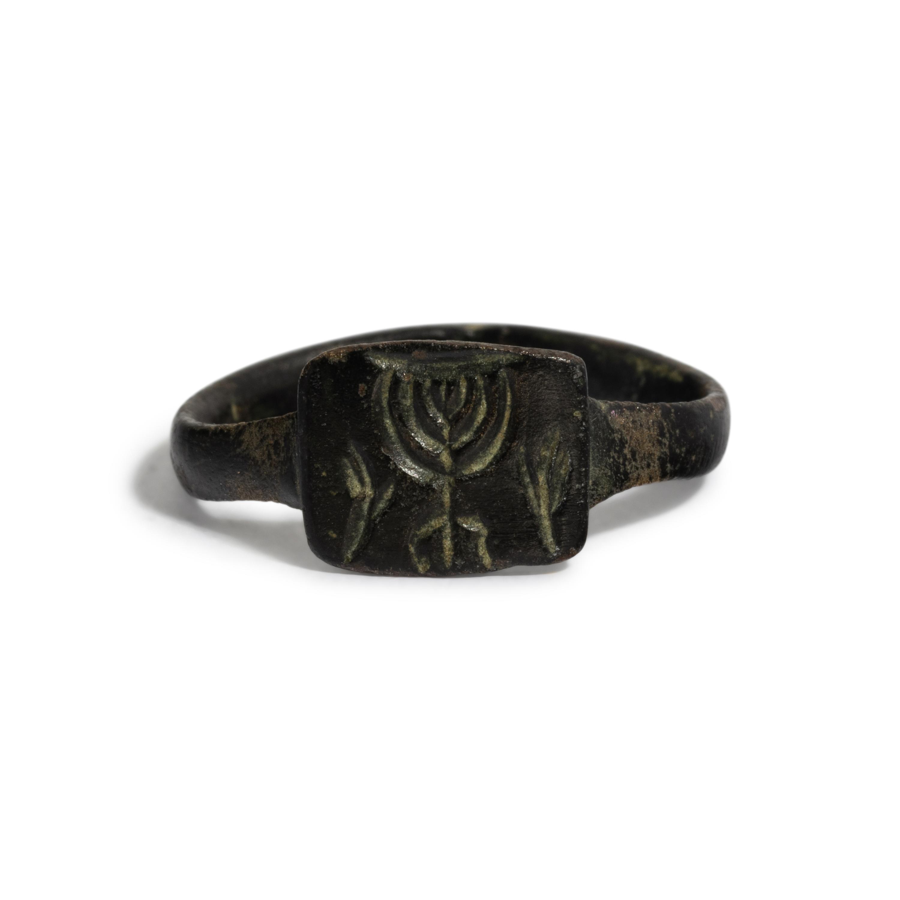 A Holy Land Bronze Ring with a Menorah