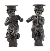 A Pair of Cast Metal Figures of Musical Fauns