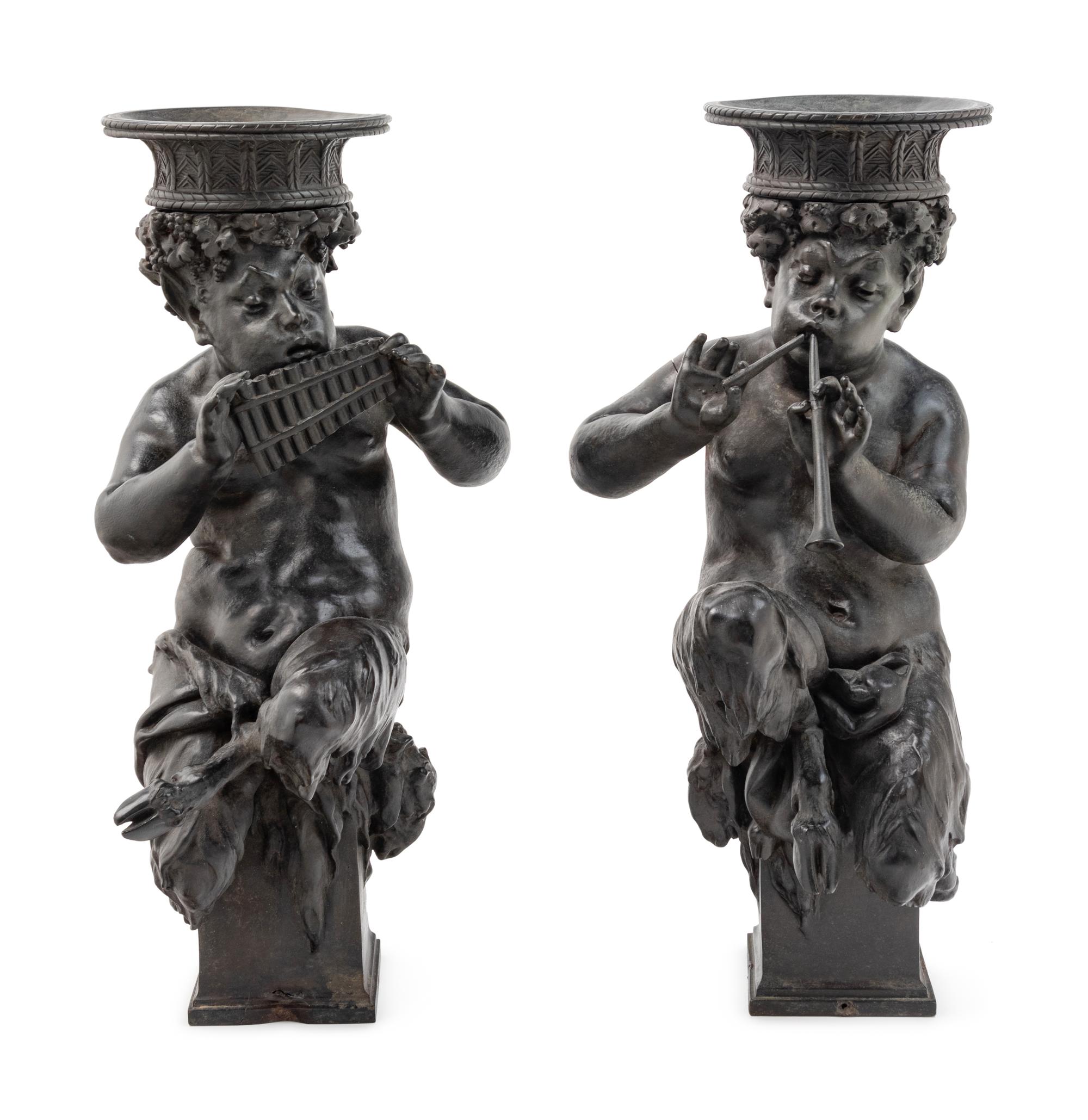 A Pair of Cast Metal Figures of Musical Fauns