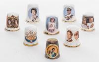 A Collection of Eight British Royal Family Commemorative Thimbles Height of tallest 1 1/8 inches.