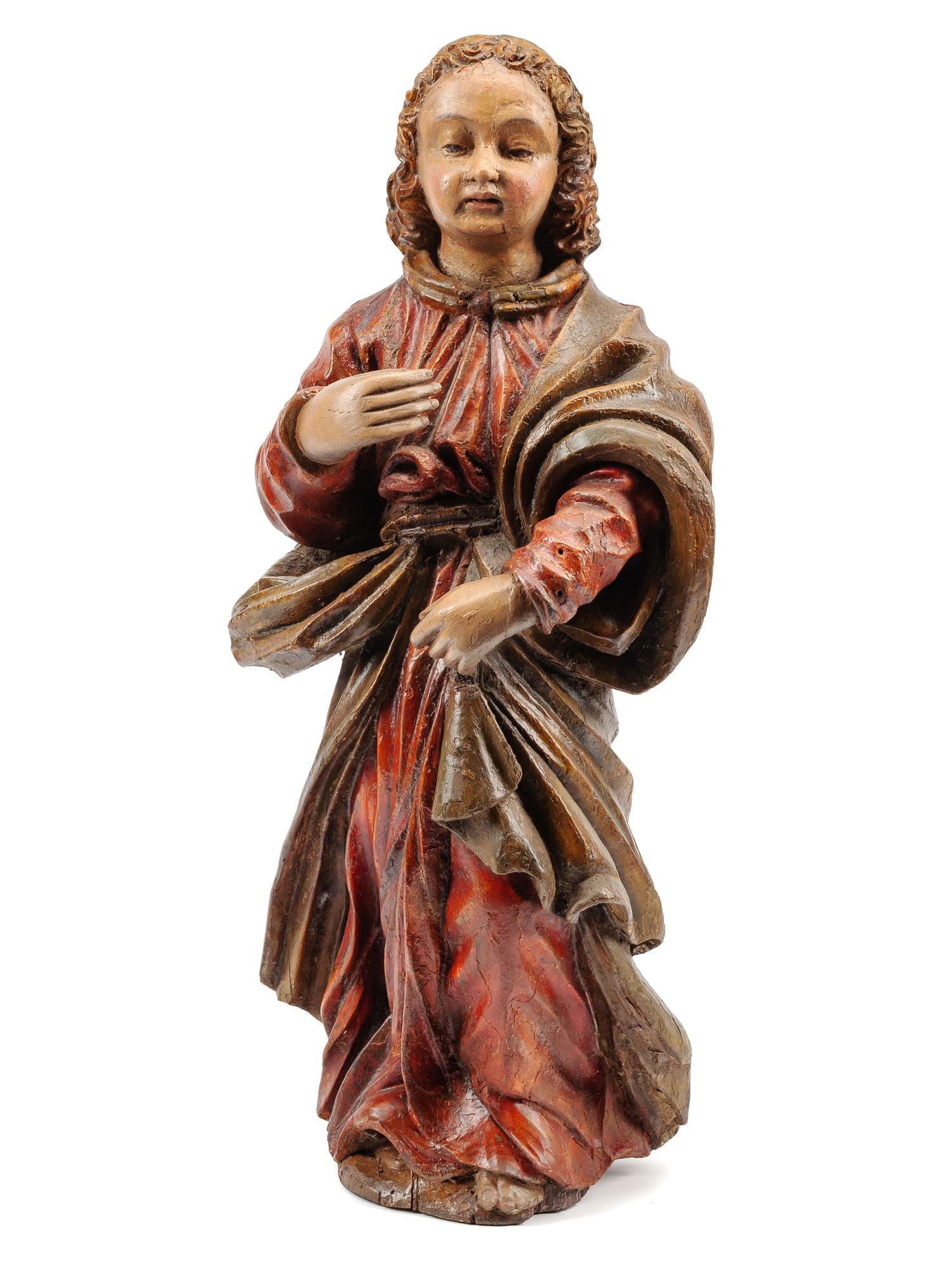 A Spanish Carved and Polychromed Wood Santos Figure