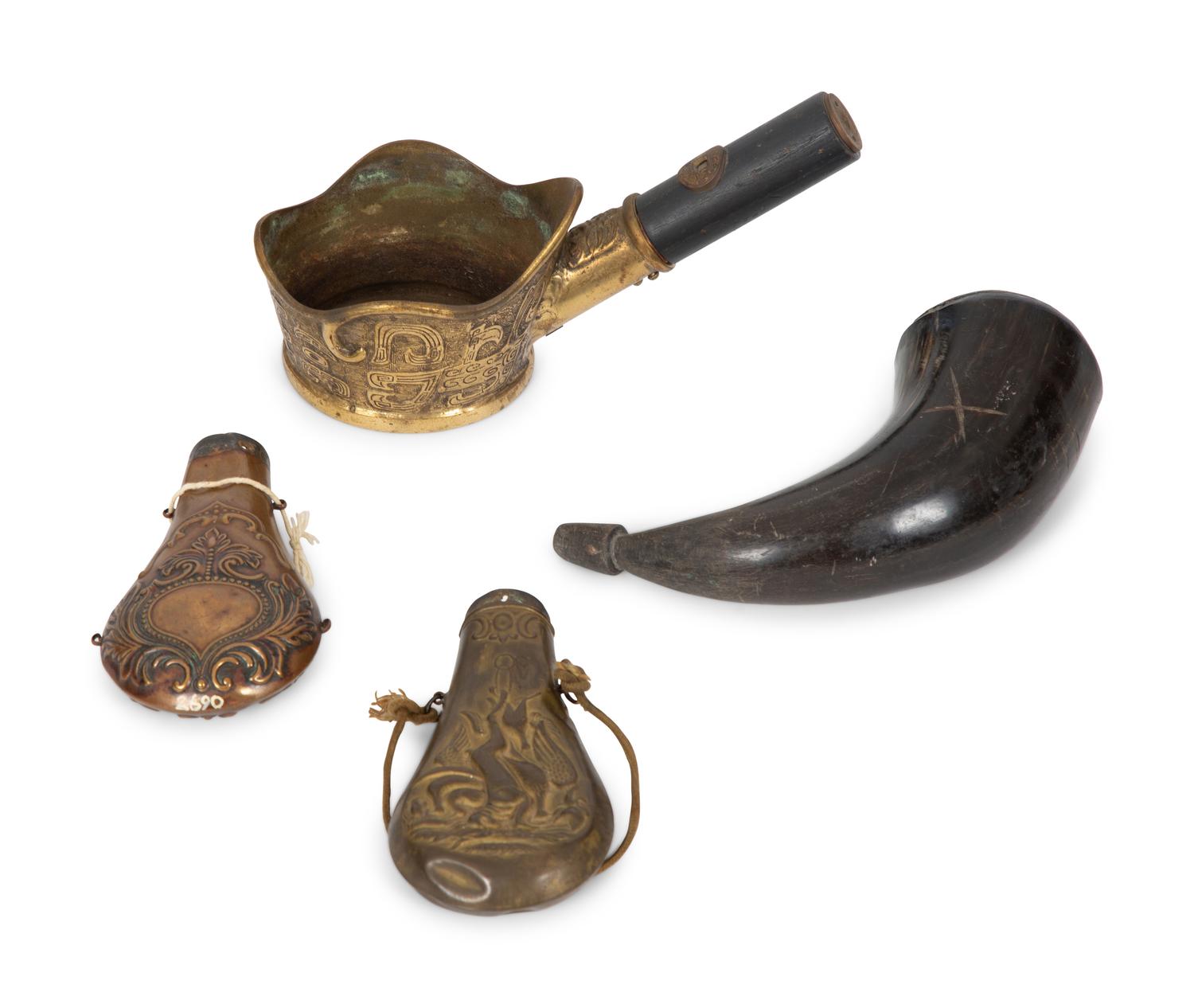 A Chinese Brass Silk Iron, Two Gunpowder Flasks and a Horn Vessel
