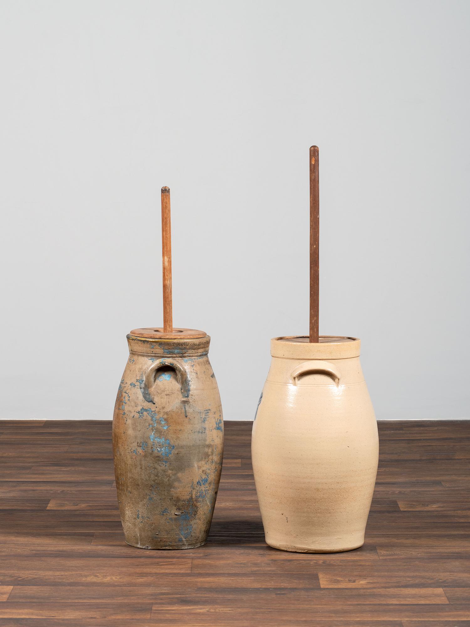 Two Cobalt Decorated Six-Gallon Stoneware Churns