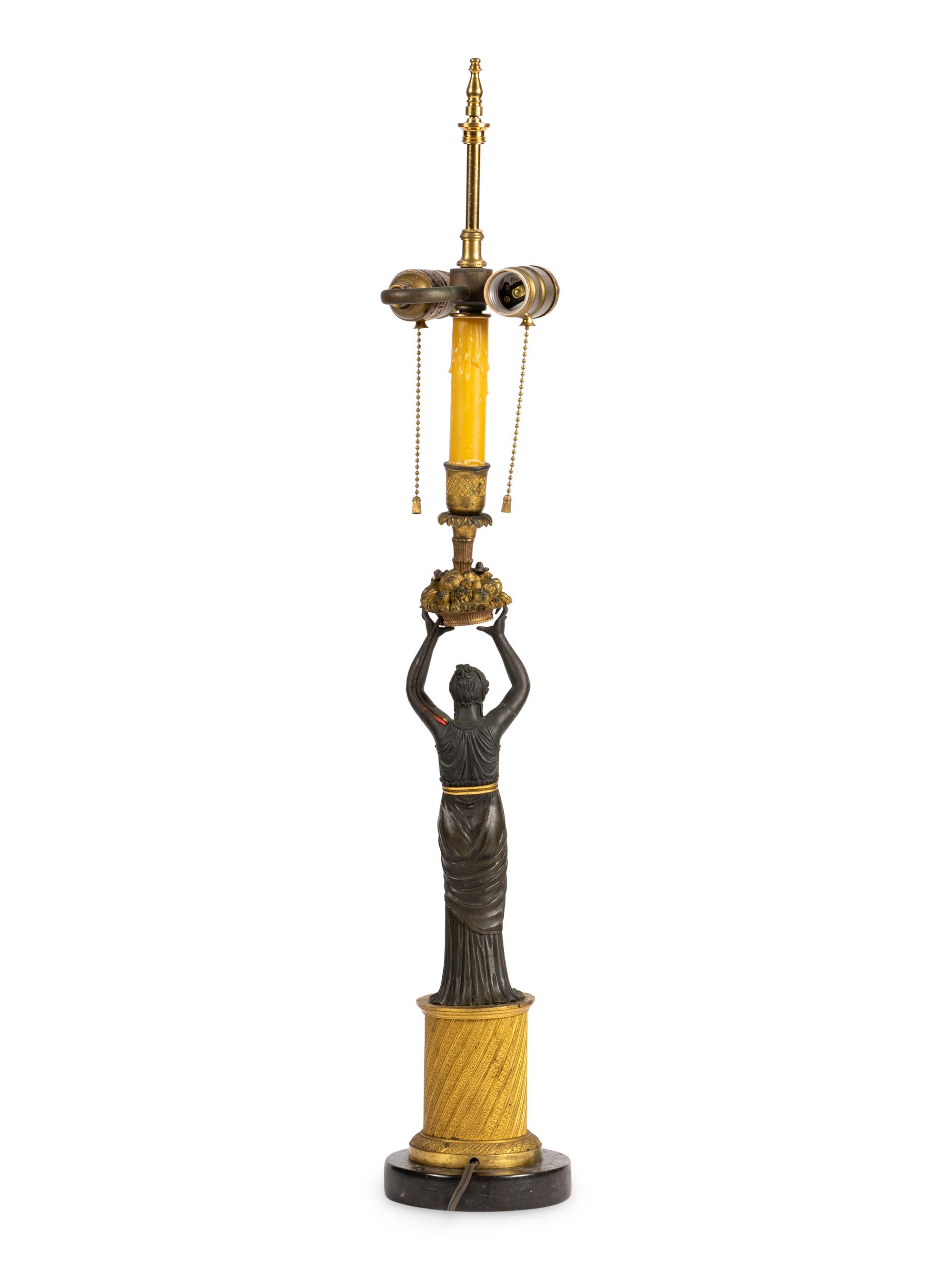 A French Gilt and Patinated Bronze Figure Mounted as a Lamp