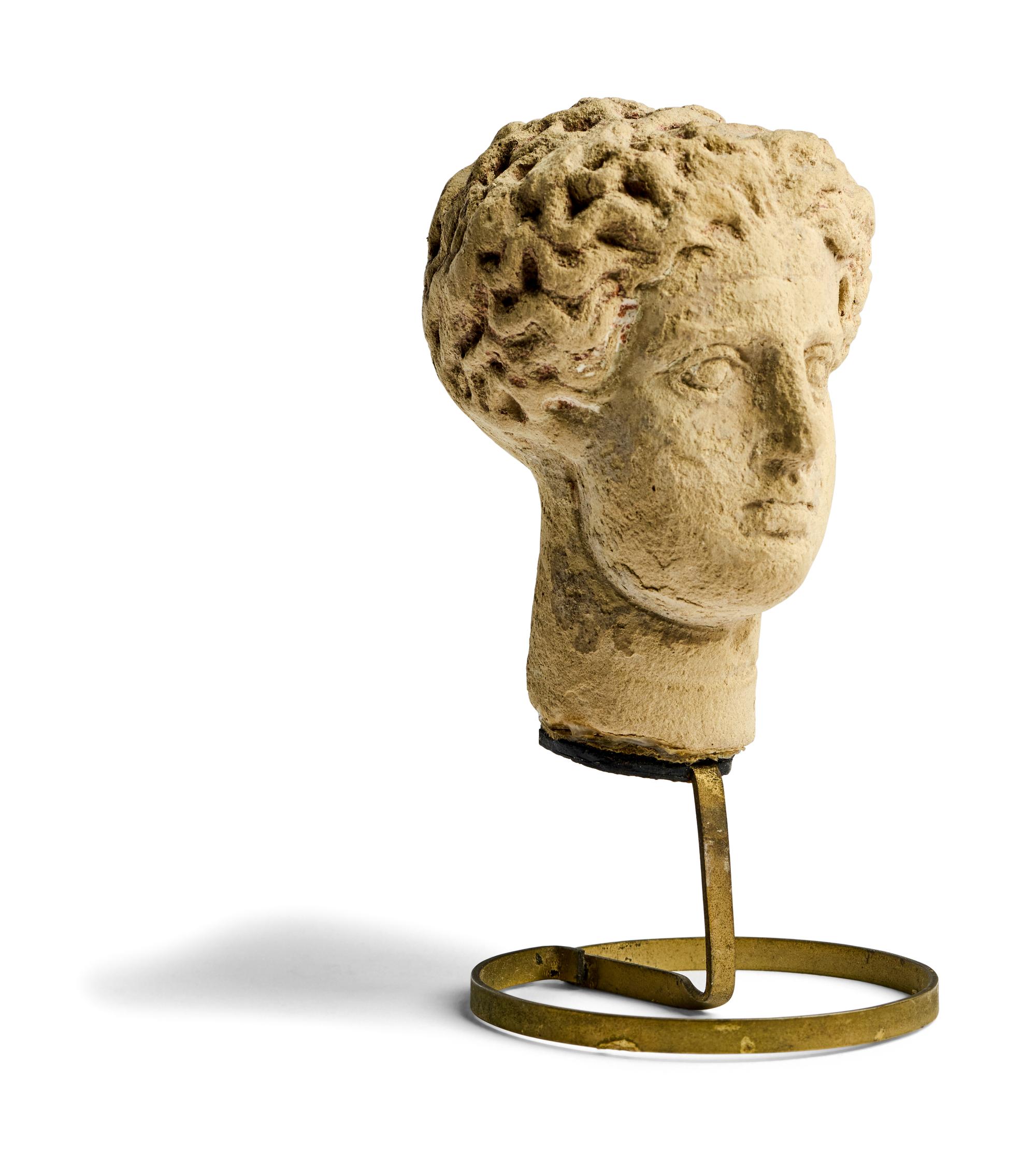 A Greek Terracotta Female Head