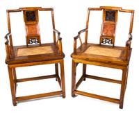 A Pair of Chinese Elmwood Open Armchairs Height 37 3/4 inches. — EARLY 20TH CENTURY