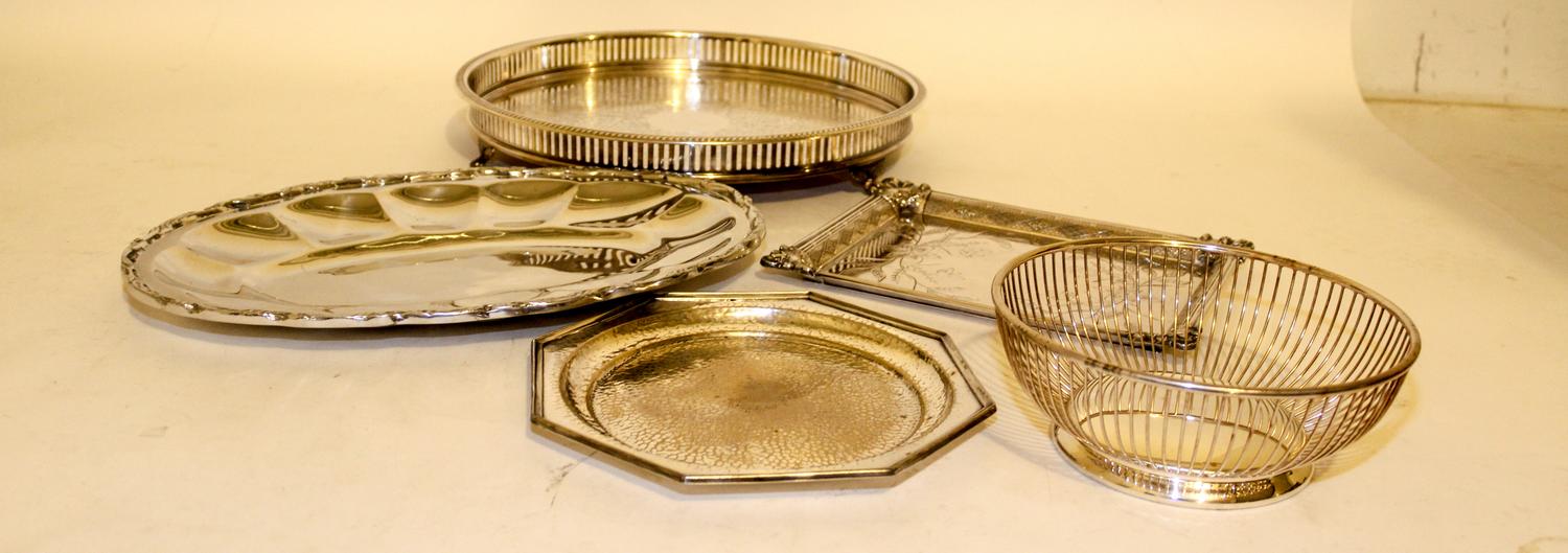 Eleven Silver-Plate Serving Trays Width of largest overall handles 26 inches.