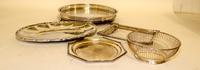 Eleven Silver-Plate Serving Trays Width of largest overall handles 26 inches.