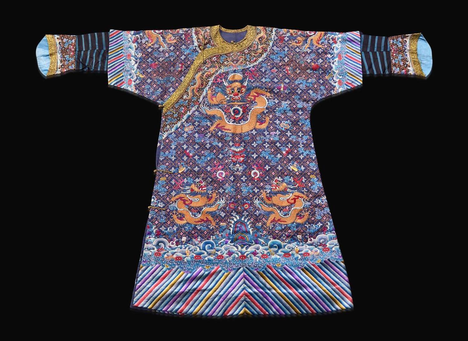 A Chinese embroidered blue silk "Nine-Dragon robe, Qing dynasty, circa 1900 海水江崖九龍紋袍 清 約1900年