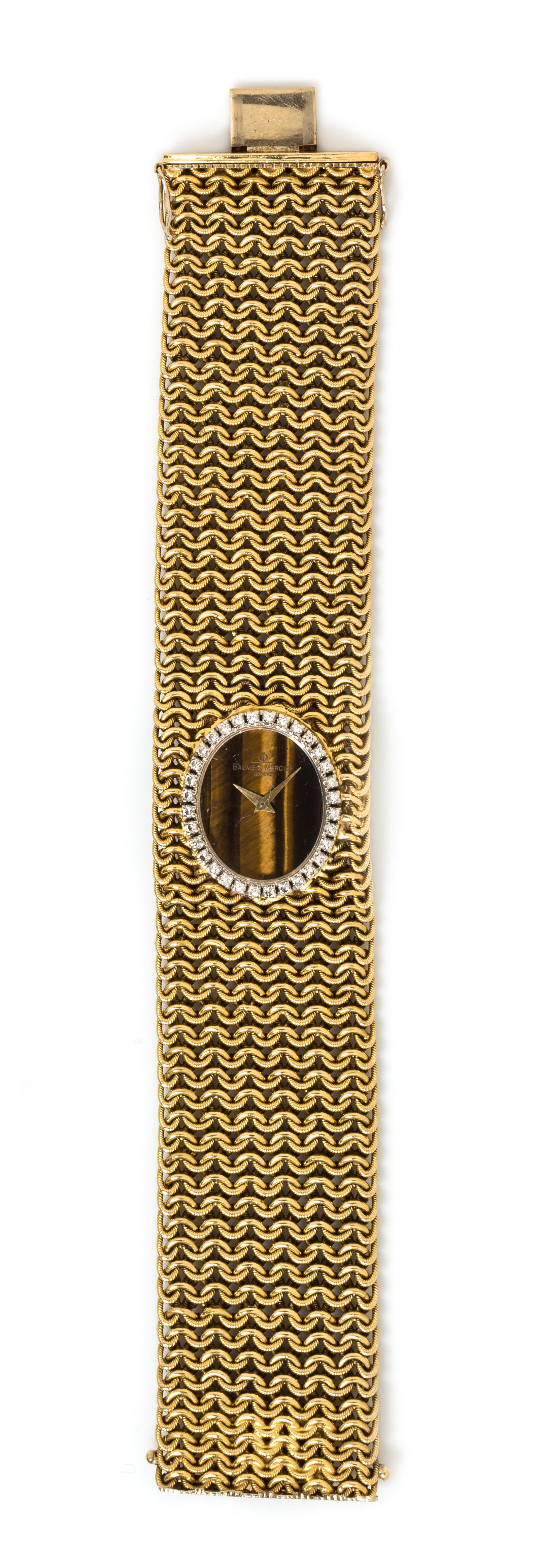 An 18 Karat Yellow Gold, Tiger's Eye and Diamond Wristwatch Bracelet, Baume and Mercier, 71.80 dwts.