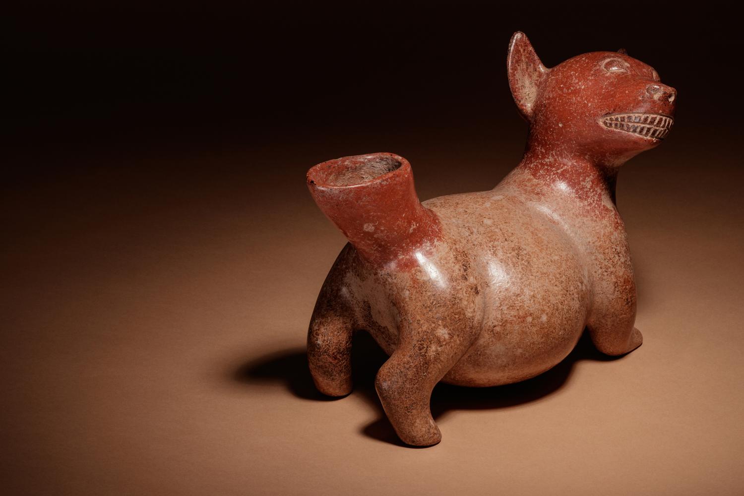 A Colima Terracotta Dog Effigy Vessel