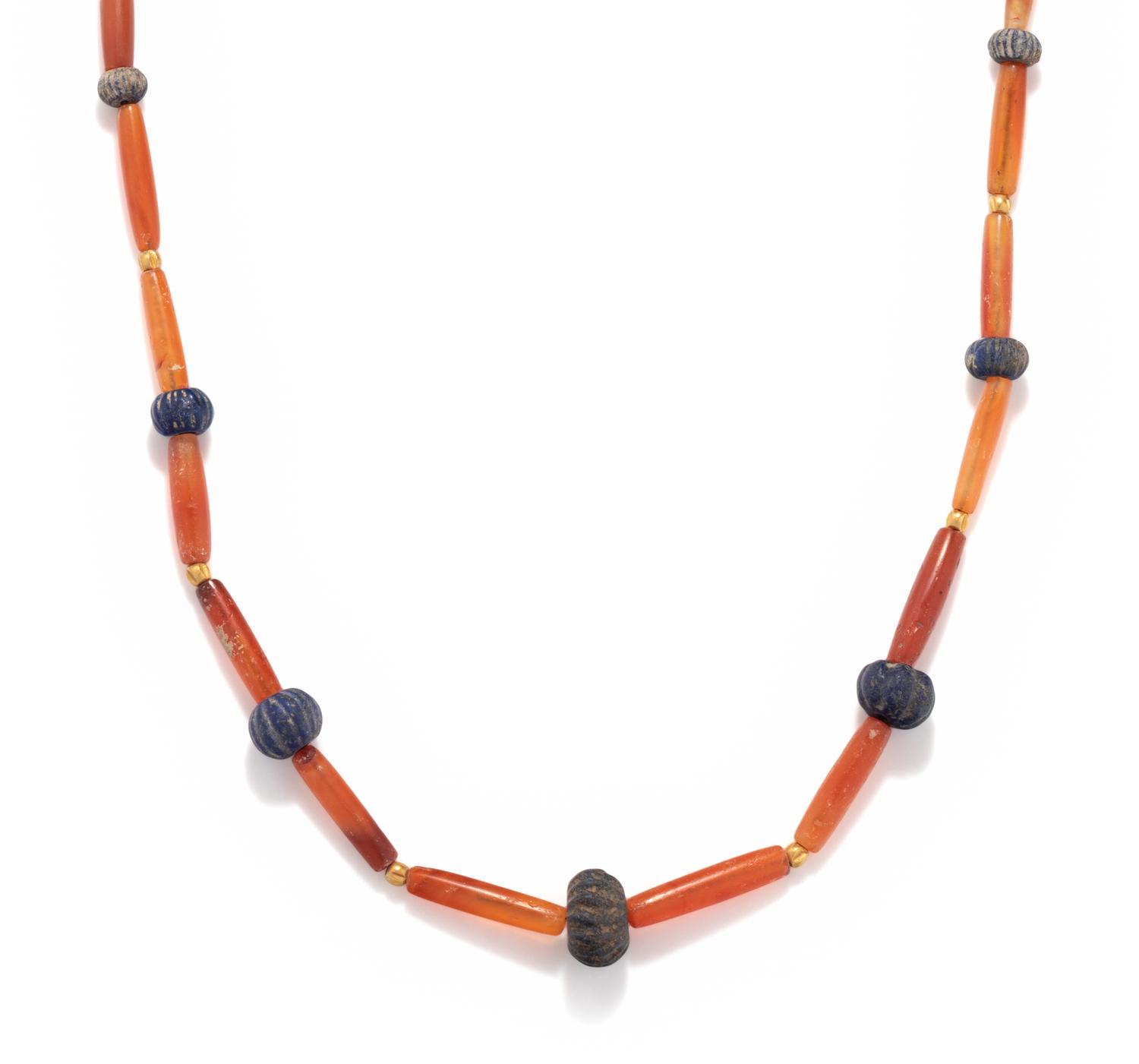 A Sumerian Lapis Lazuli, Carnelian, and Gold Bead Necklace