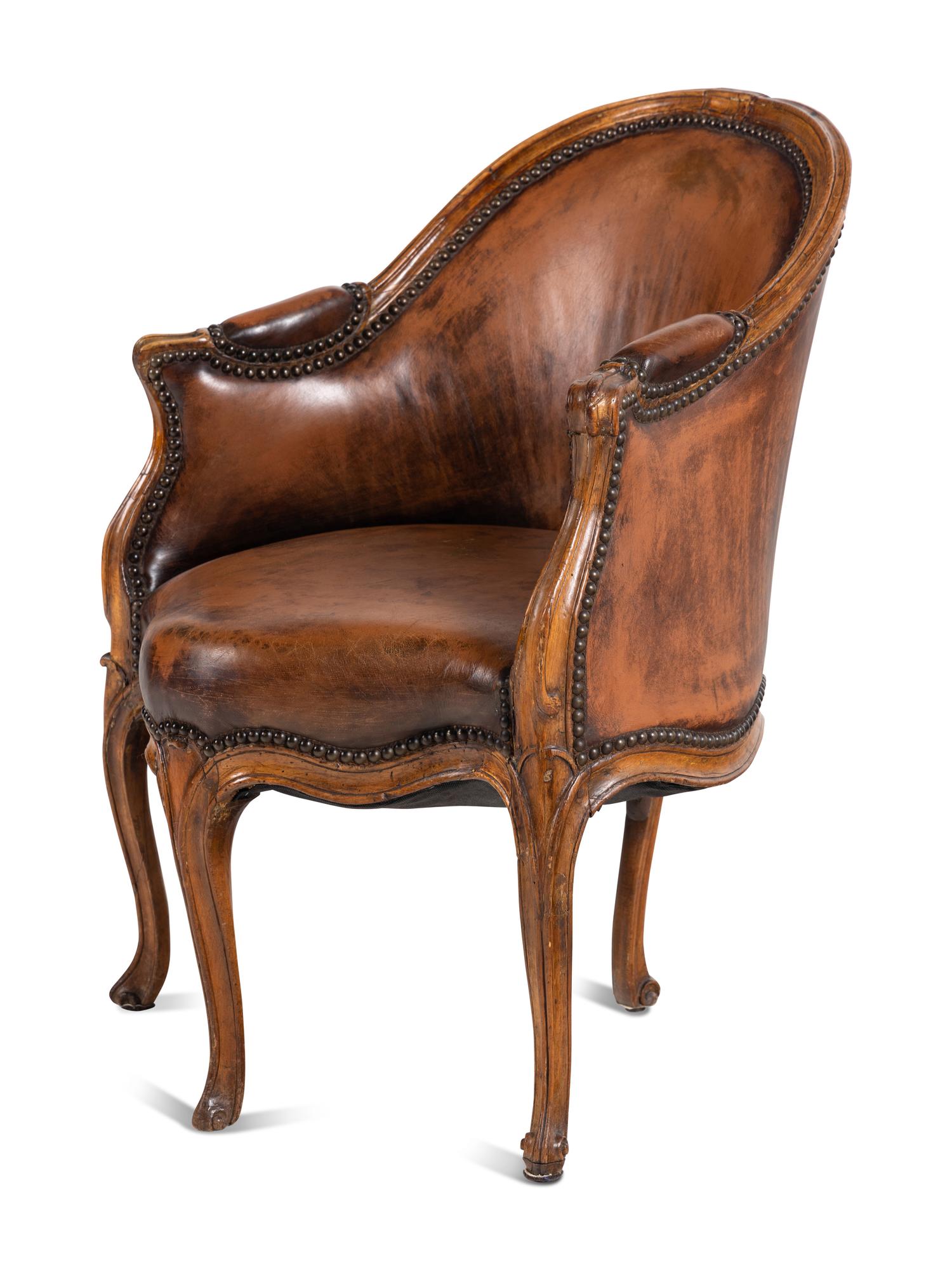 A Louis XV Leather Upholstered Bergère