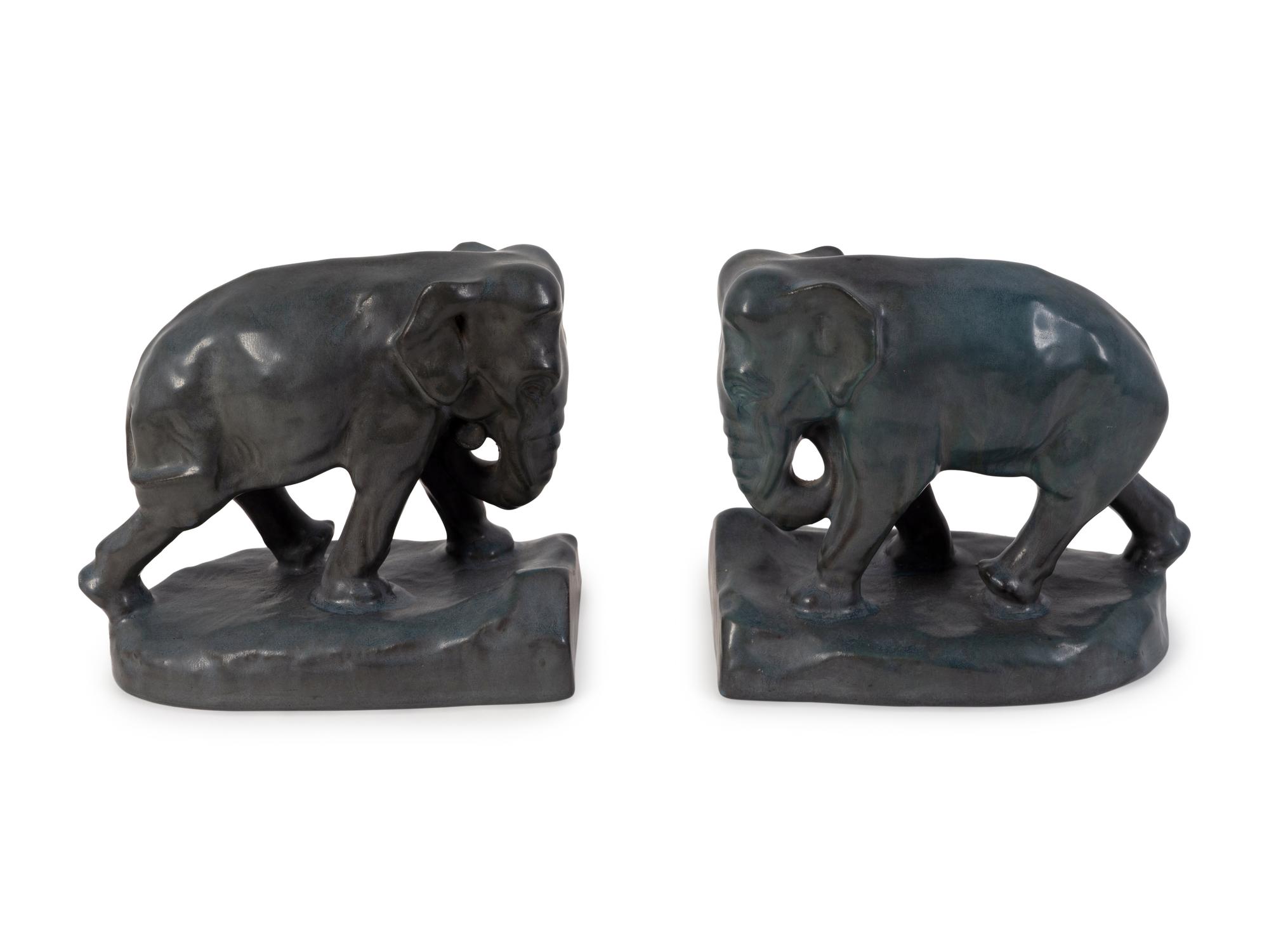 A Pair of Rookwood Green-Glazed Pottery Elephant Bookends — DATED 1923