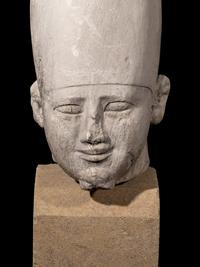A Cast Stone Head of a Pharaoh Wearing a Hedjet Crown