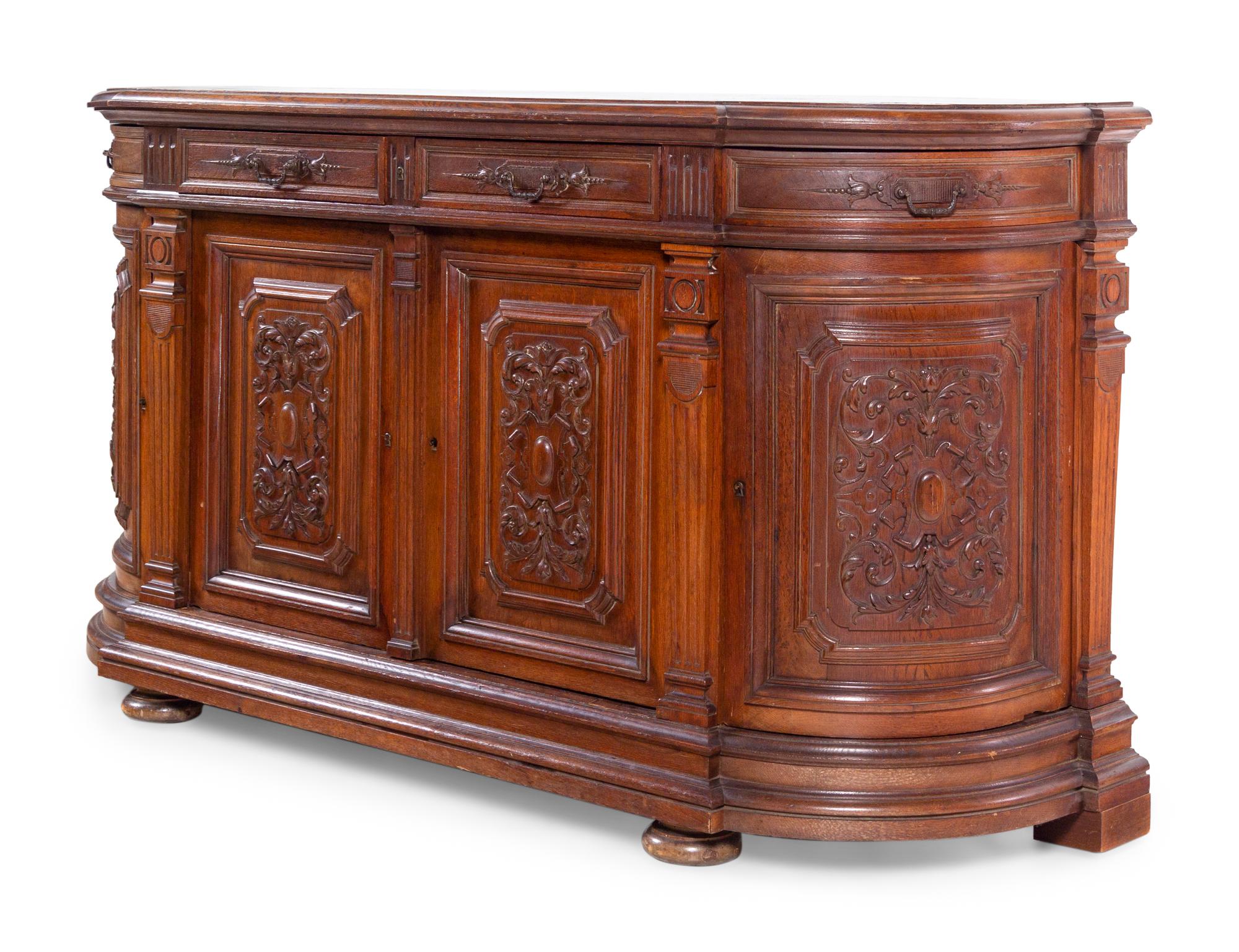 A Renaissance Revival Carved Oak Buffet