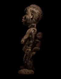 A Dan Wood Maternity Figure with Child