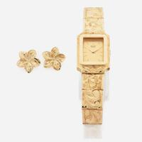 A gold bracelet watch and matching earrings, Seiko