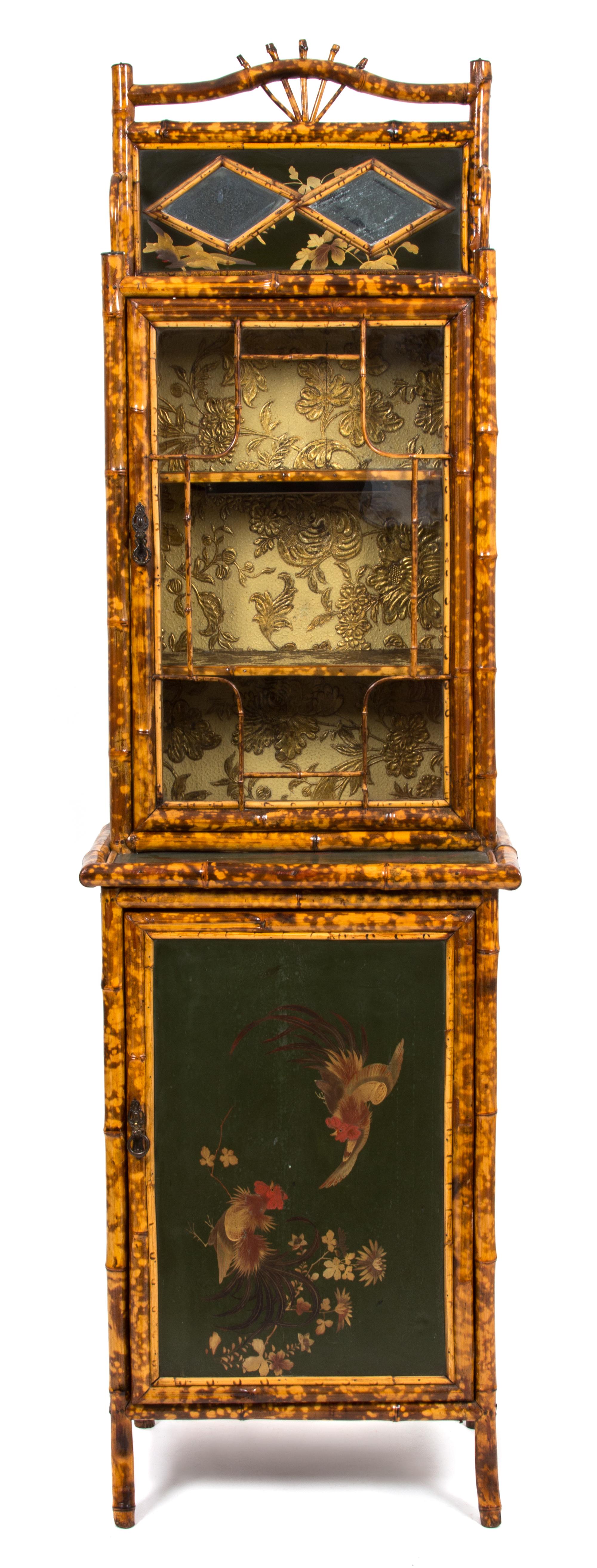 A Victorian Lacquered and Gilt Bamboo Display Cabinet Height 77 x width 22 1/4 x depth 16 1/2 inches.