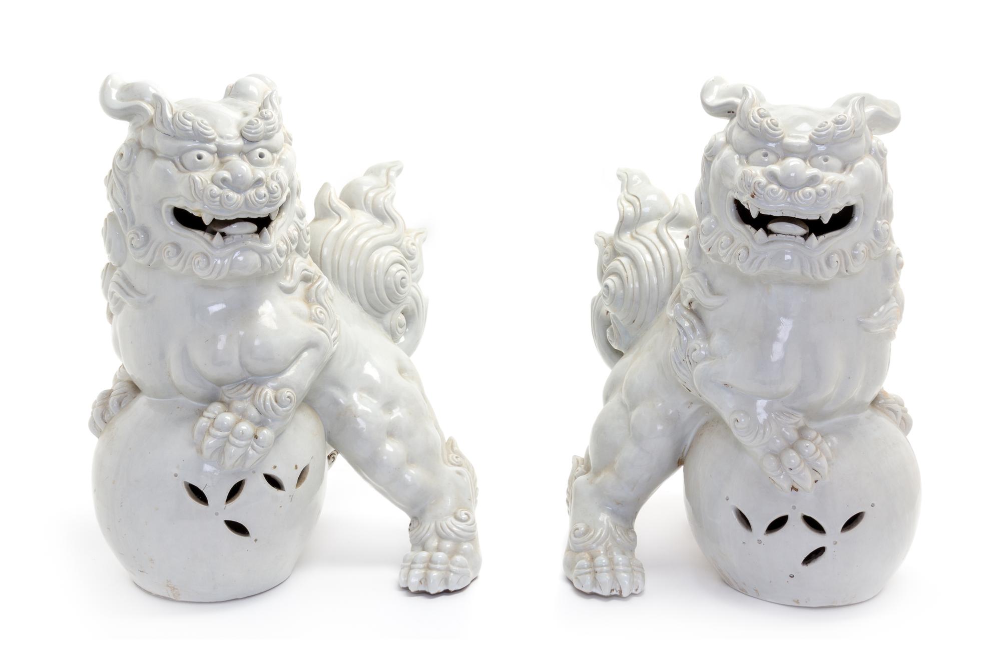 A Pair of Japanese Ceramic Temple Lions Height 20 1/2 inches.