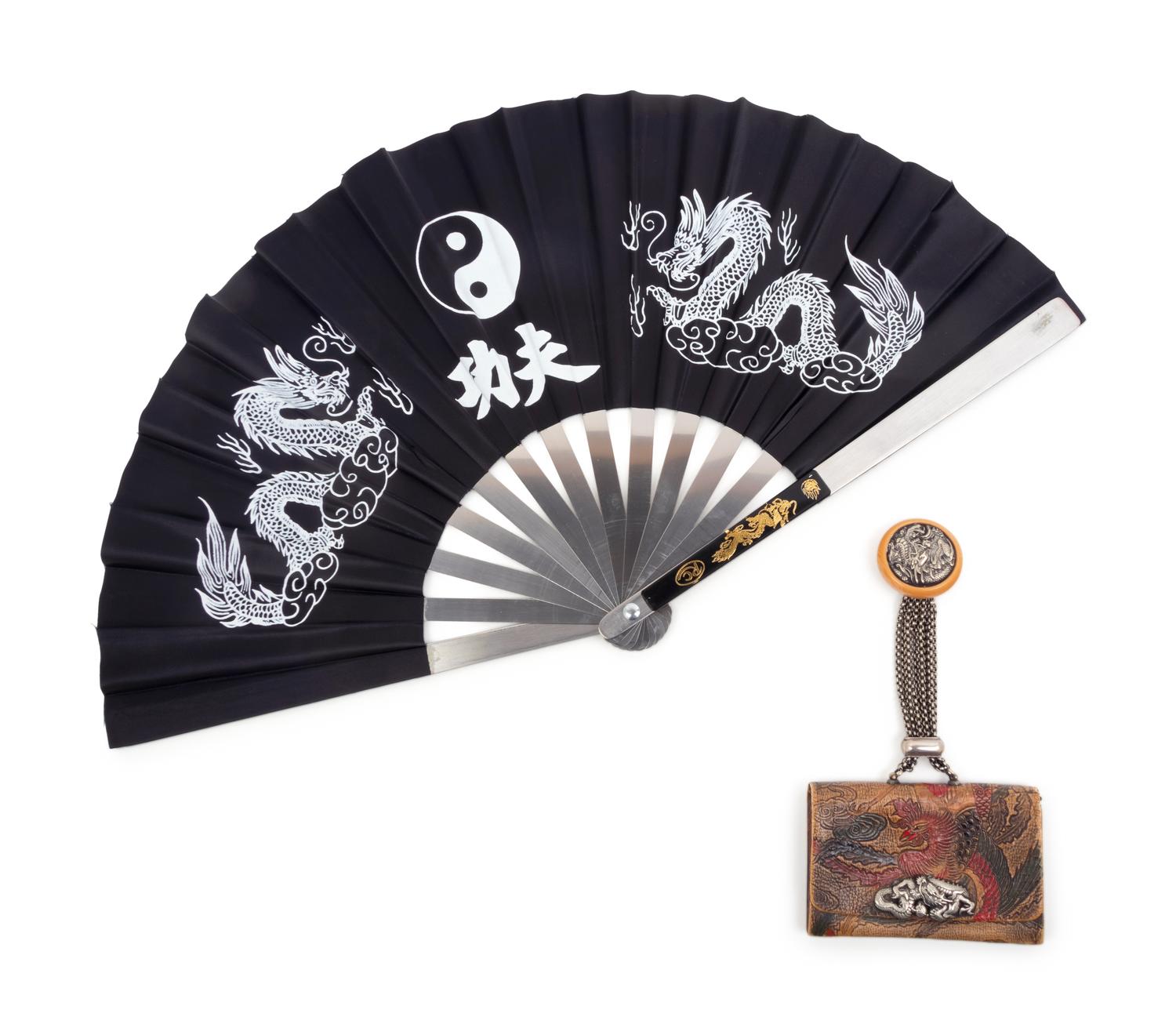 A Leather Purse and A Fabric Fan