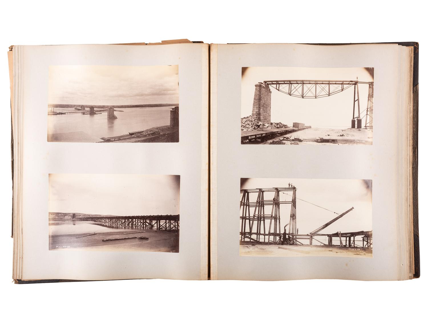 [WESTERN AMERICANA]. Album of photographs showing the construction of the "Bismarck Bridge." [Dakota Territory]: [F. Jay Haynes], [1882].