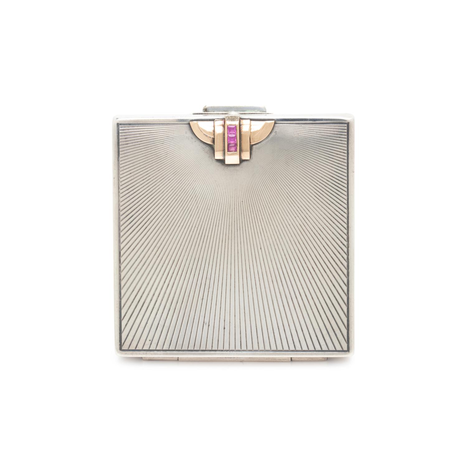 TIFFANY & CO., STERLING SILVER, YELLOW GOLD AND RUBY COMPACT