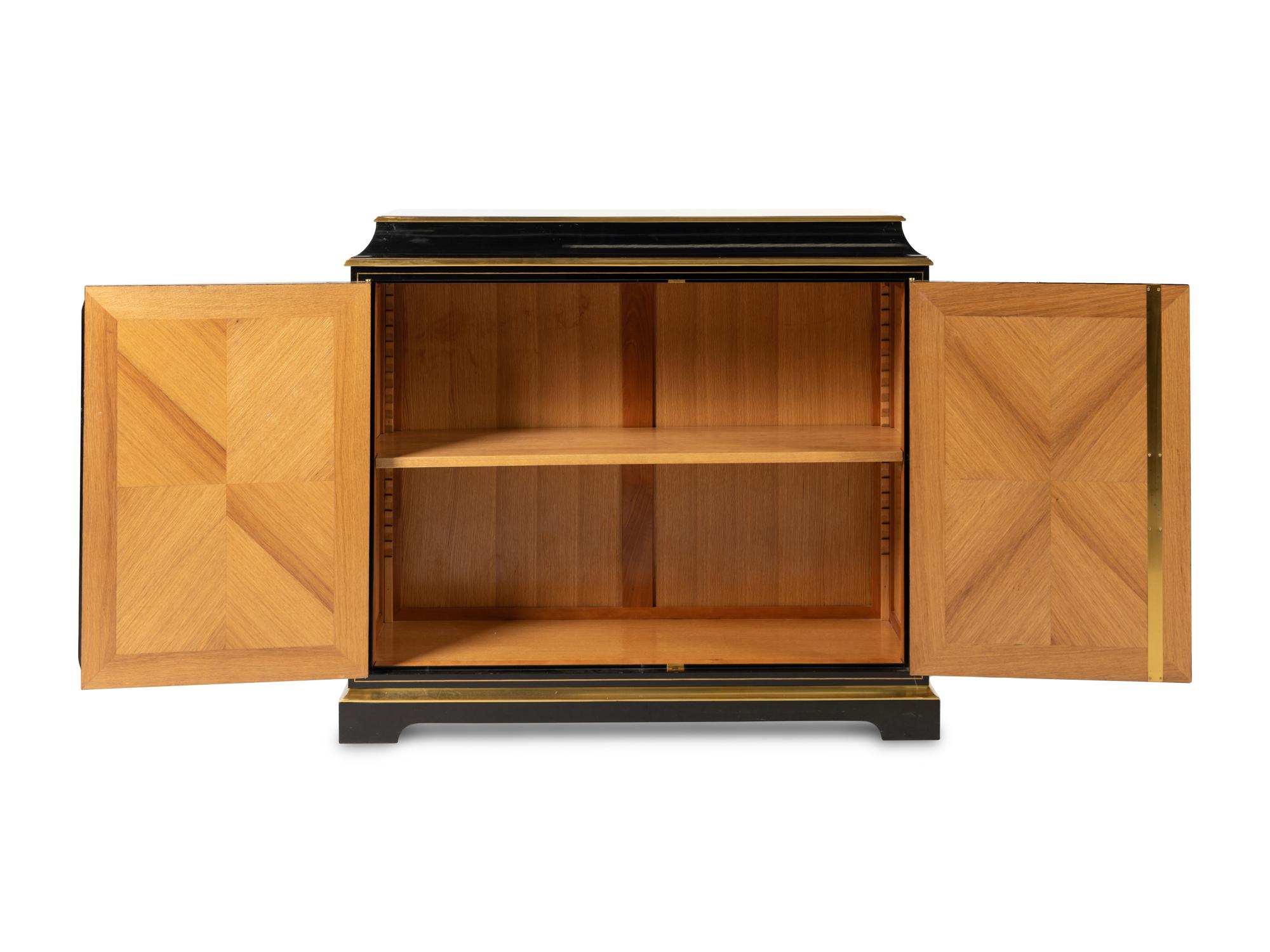 A Pair of Custom Gilt Bronze Mounted Ebonized Cabinets