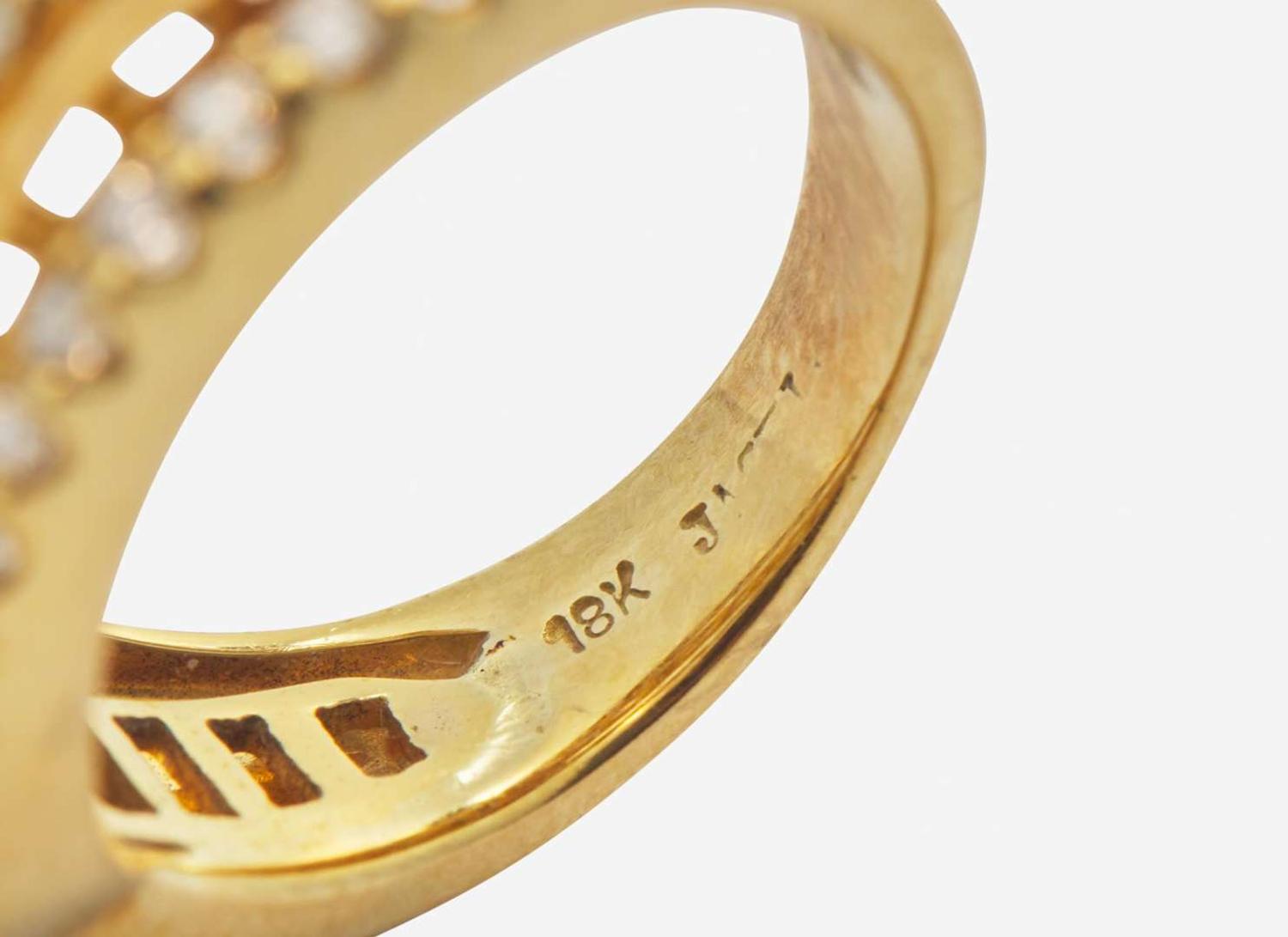 A Ladies 18K Yellow Gold and Diamond Ring