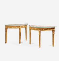 A pair of George III scagliola inlaid and giltwood demilune tables circa 1780