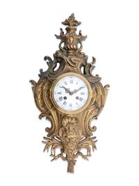 A Louis XVI Style Gilt Bronze Cartel Clock