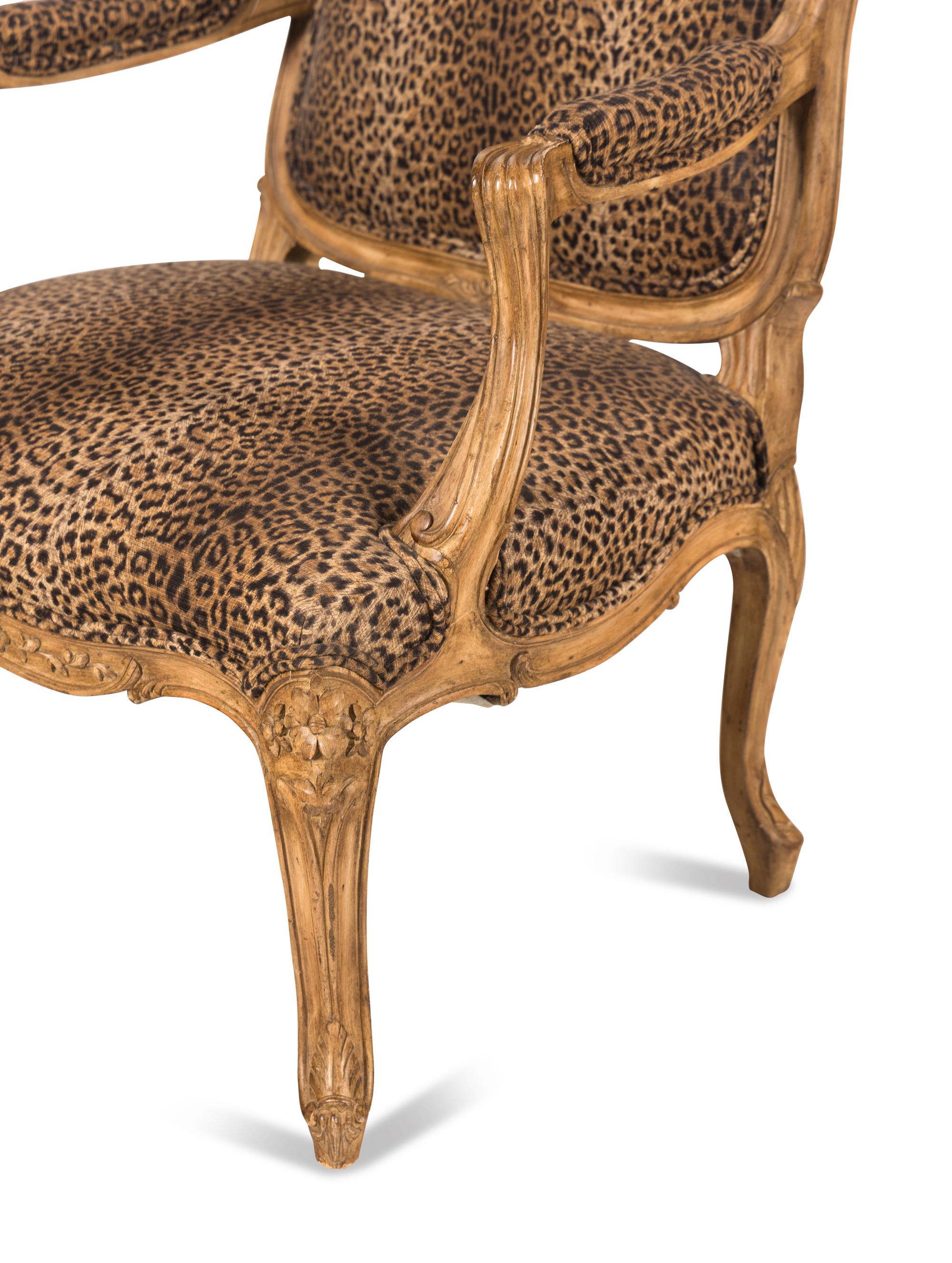 A Pair of Louis XV Style Carved Wood Fauteuils