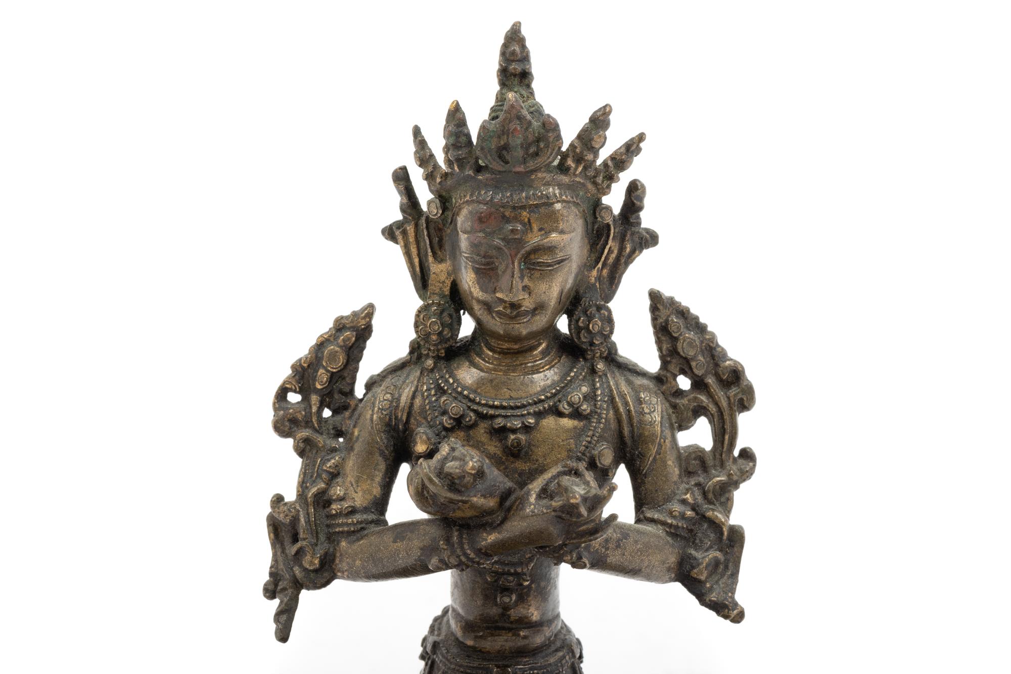 A Tibetan Bronze Seated Figure of Vajrasattva