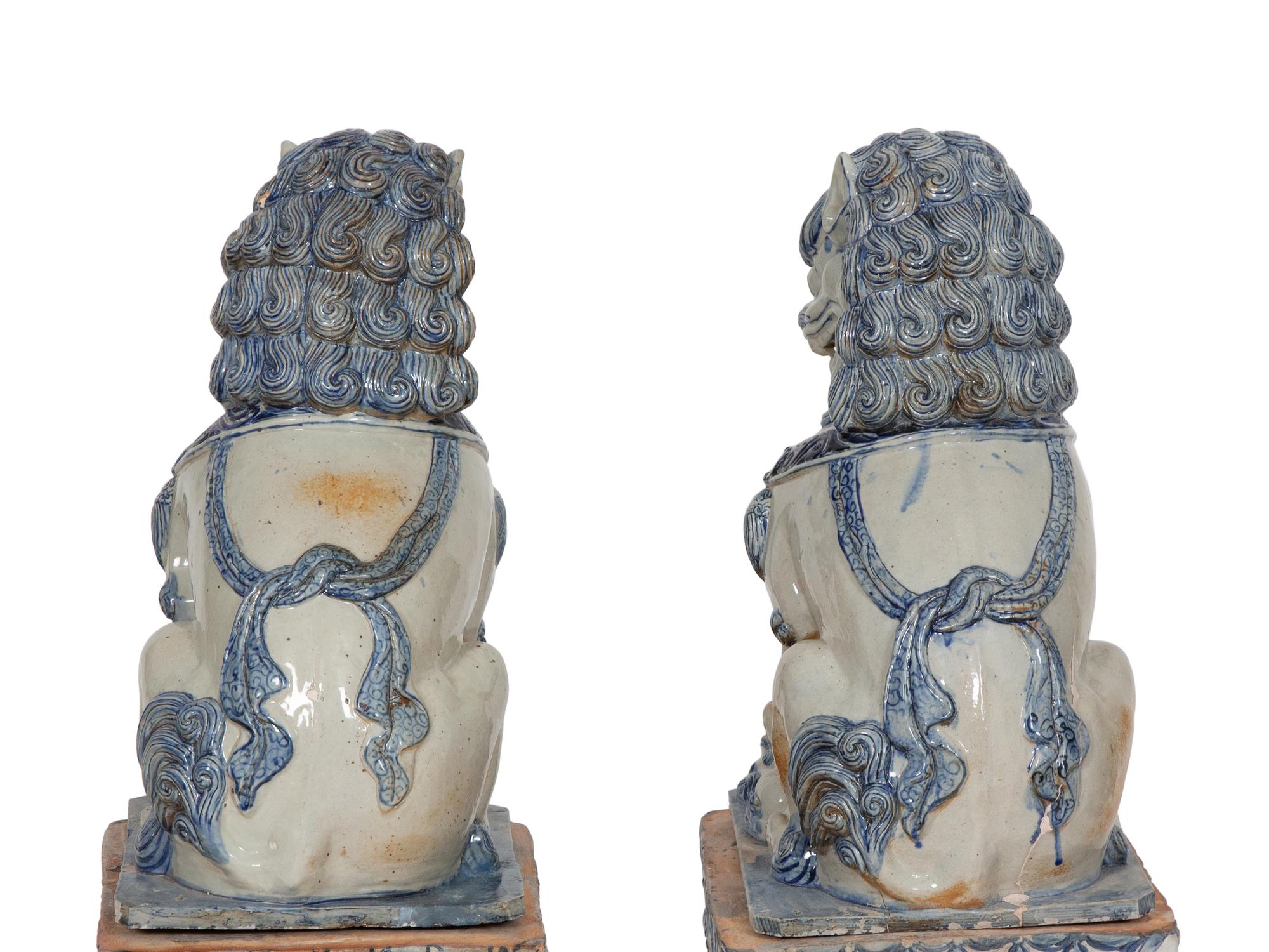 A Pair of Chinese Glazed Ceramic Guardian Lions