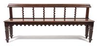 A Jacobean Revival Hall Bench Width 65 inches. — 19TH/20TH CENTURY