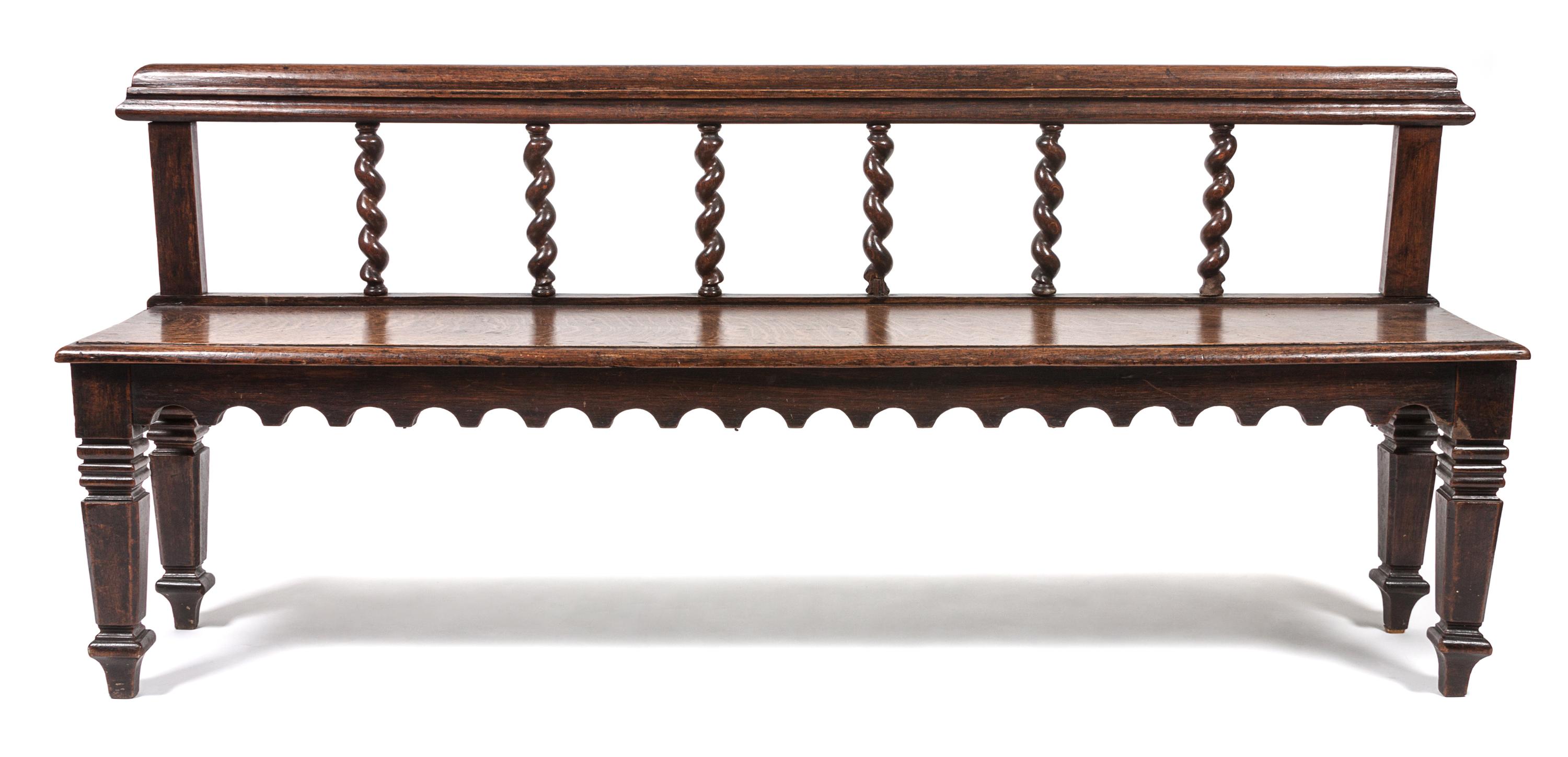 A Jacobean Revival Hall Bench Width 65 inches. — 19TH/20TH CENTURY