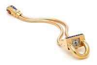 A Retro 18 Karat Yellow Gold and Sapphire 'Cadenas' Wristwatch, Van Cleef & Arpels, New York, 40.60 dwts.
