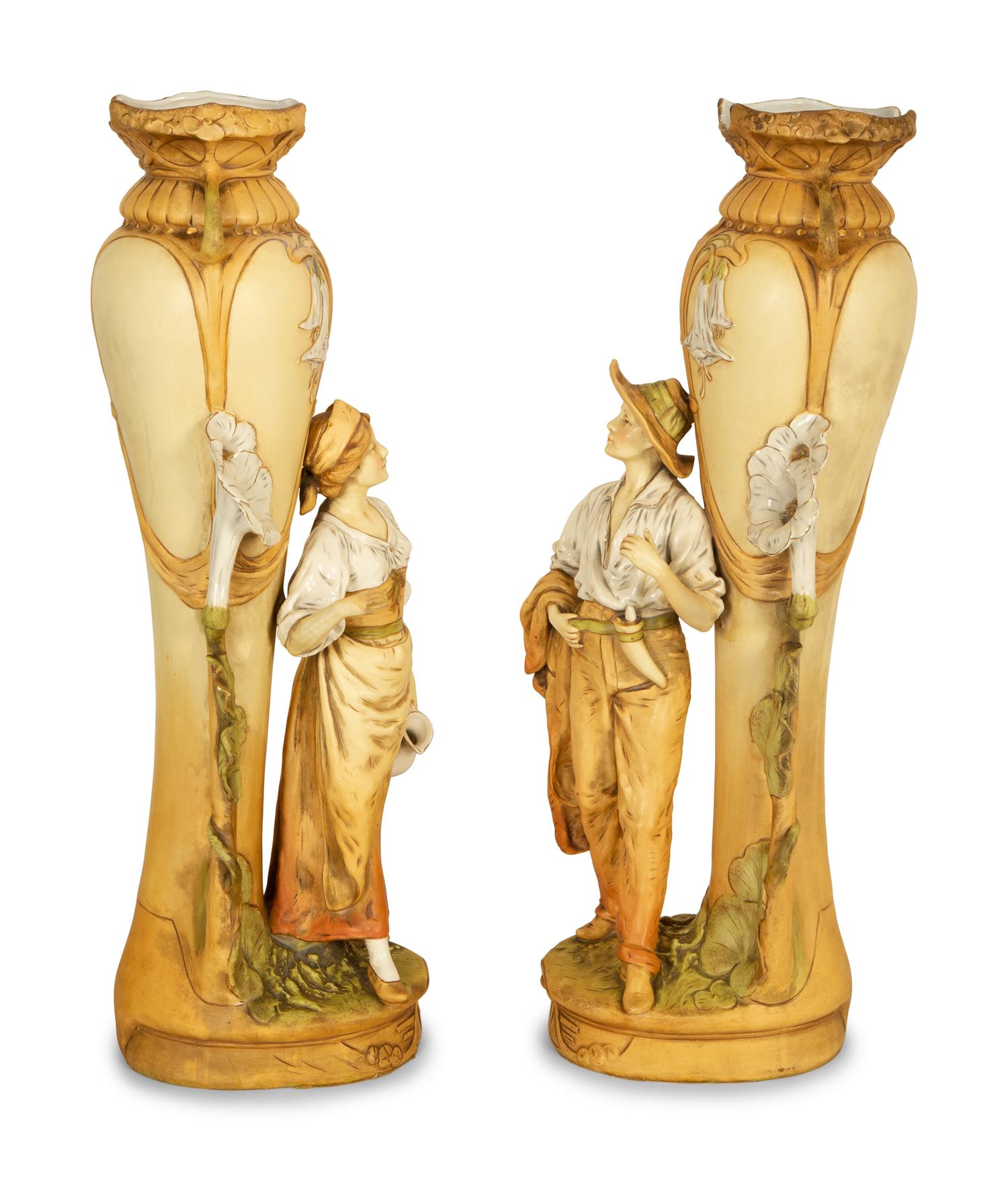 A Pair of Royal Dux Porcelain Figural Vases