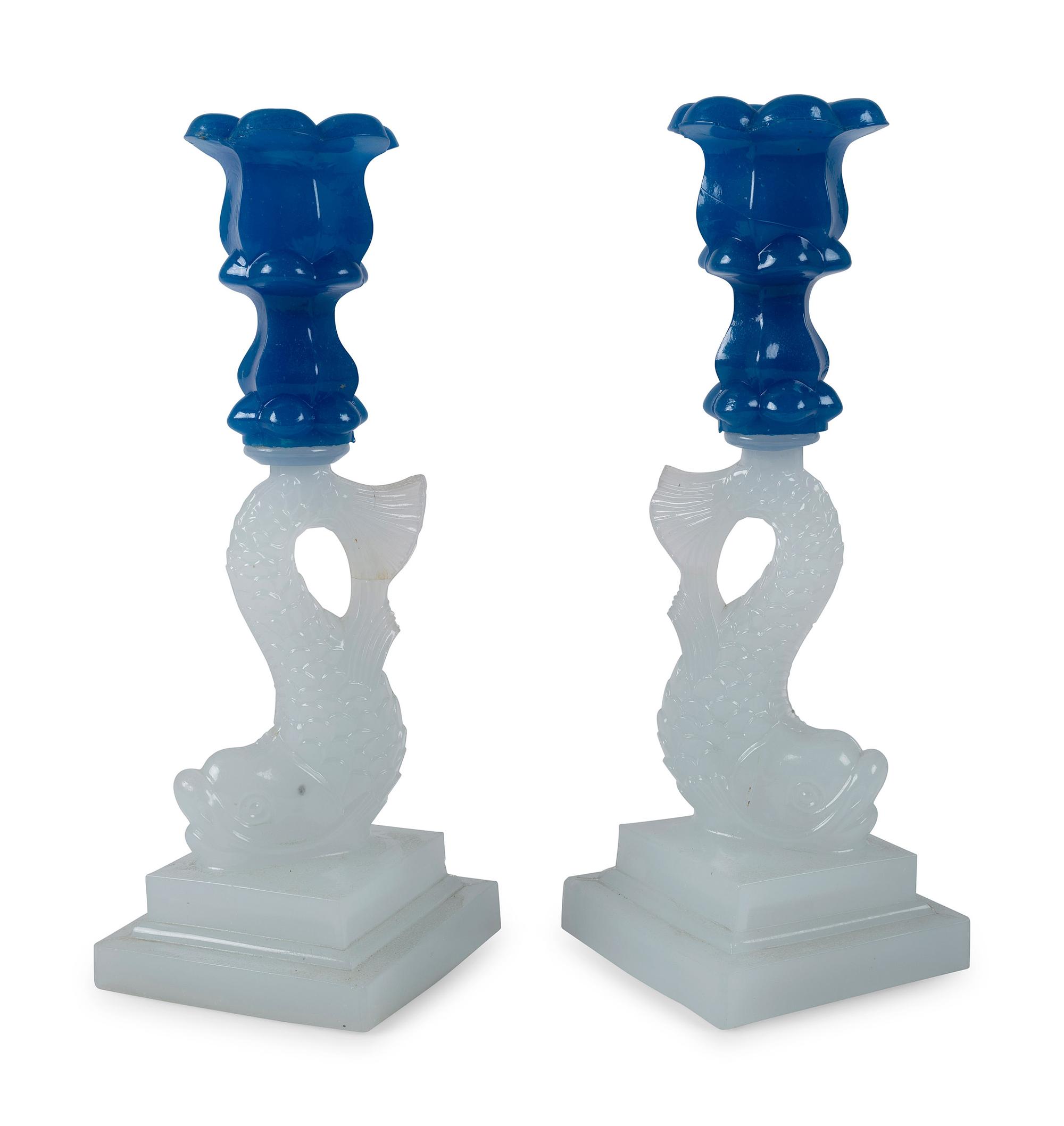 A Pair of Sandwich Glass Dolphin Candlesticks