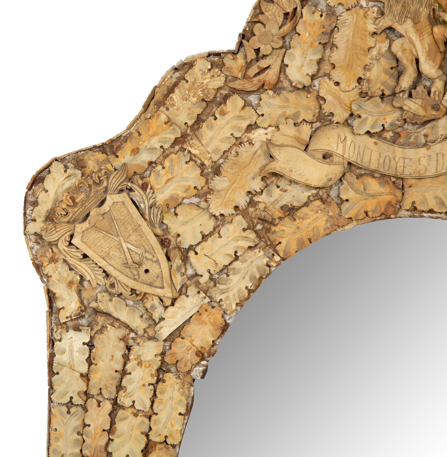A Continental Carved Bone Mirror