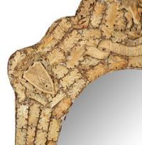 A Continental Carved Bone Mirror