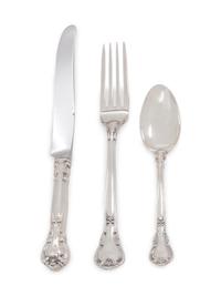 Chantilly pattern, comprising: 7 luncheon knives with stainless steel blades 8 dinner forks 7 luncheon forks 19 salad forks 25 teaspoons 12 soup spoons 15 cocktail forks 12 butter spreaders 5 dessert spoons 2 child's forks 14 serving utensils 1 tea strainer 2 serving utensils with stainless steel elements 129 items total.